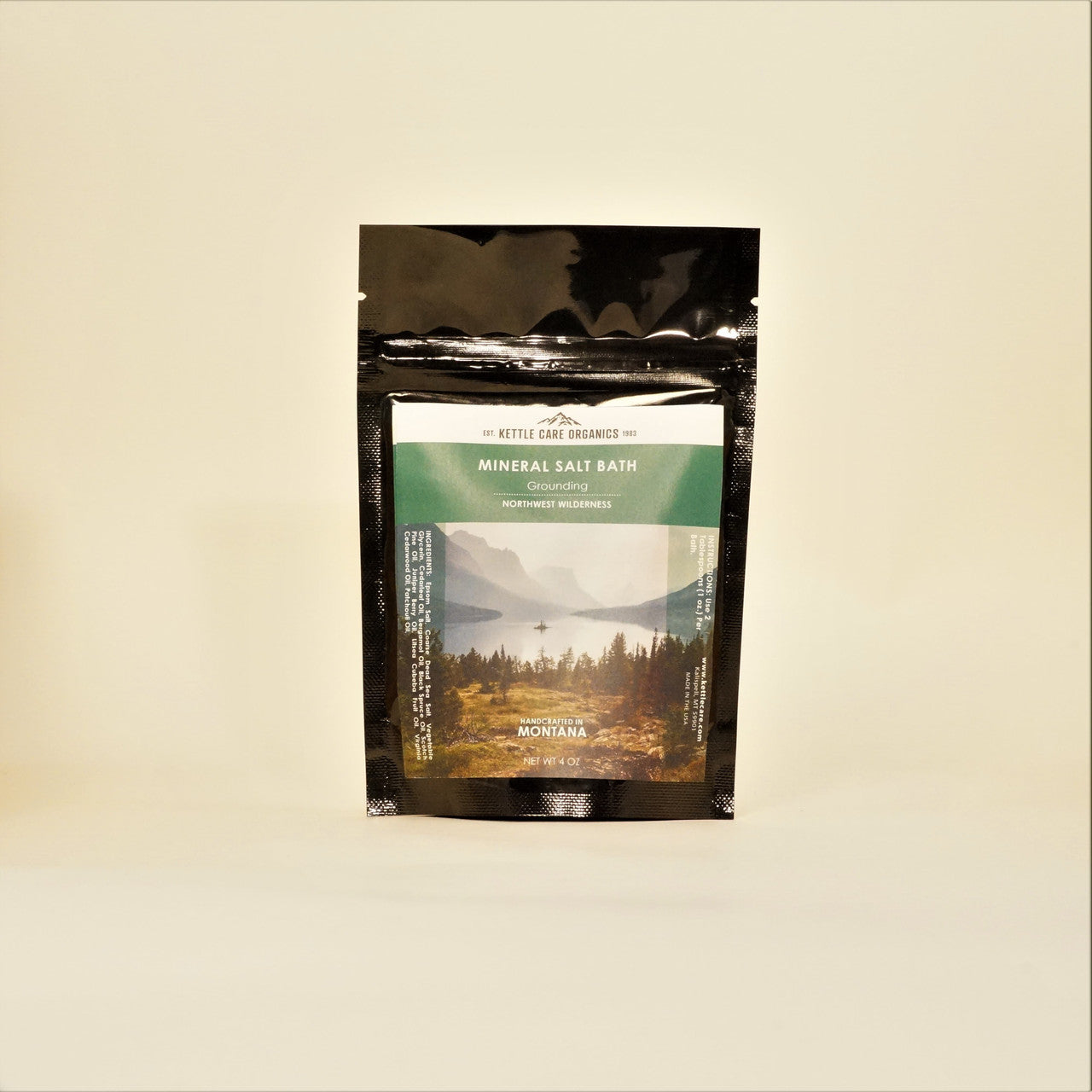 Grounding Northwest Wilderness Mineral Salt Bath, 4 oz resealable black bag, white and green label with mountains