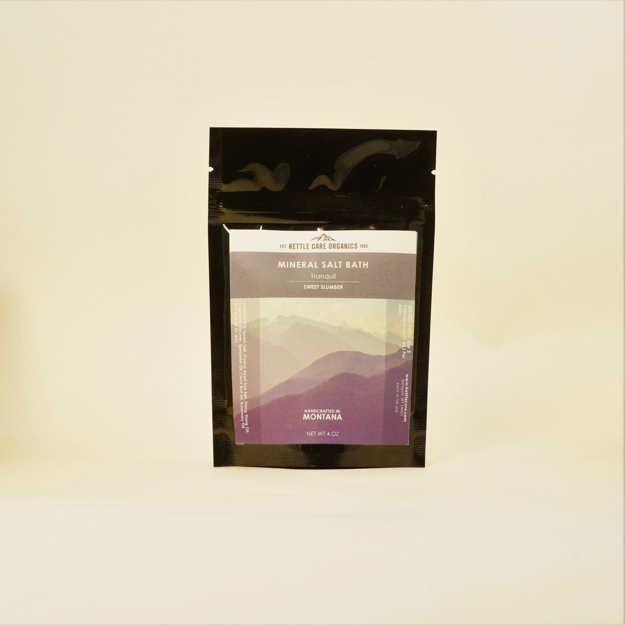 Tranquil Sweet Slumber Mineral Salt Bath, 4 oz, black resealable bag, white and grey label with mountains